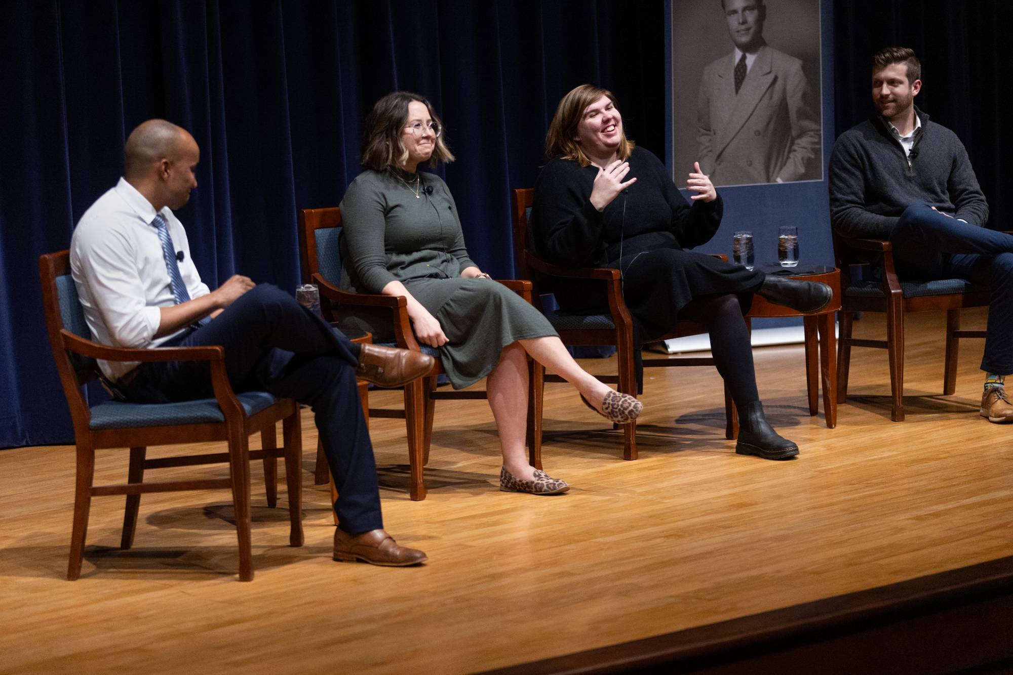 person speaking at a podium
